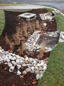 The fall installation of a bioretention facility in Montgomery County. During maintenance, sediment is collected on the concrete cleanout pad. Image credit: Montgomery County, Md., Department of Environmental Protection